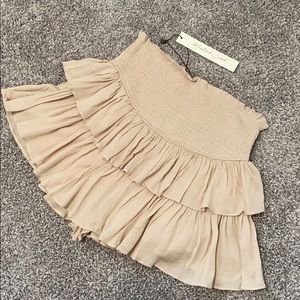 Brand new, never worn, tags still on, beige skort